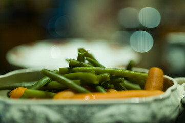 Christmas roast food with vegetable and cakes
