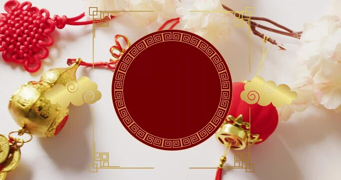 Animation of chinese pattern and clouds decoration on red background