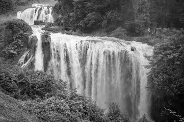Fototapeta premium The majesty of the Marmore waterfall. Dream Umbria. Black and white