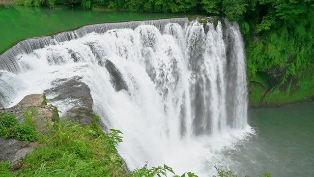 The largest curtain waterfall in Taiwan. "Taiwan version of Nicaragua Falls". Shifen Waterfall, Pingxi District, New Taipei City, Taiwan.