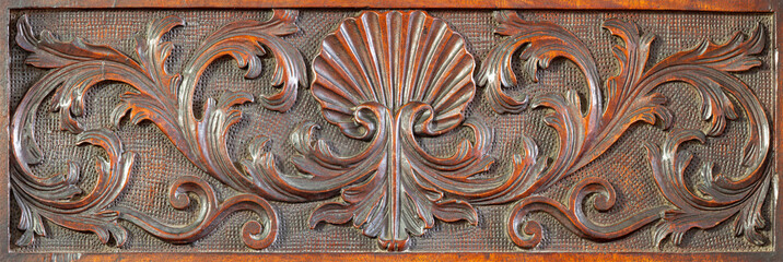 ANNECY, FRANCE - JULY 10, 2022:  The carved baroque floral relief in the church Eglise Saint...