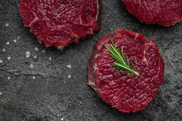 Beef medallions with rosemary and spices, Food recipe background. Close up