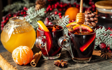 christmas hot mulled wine hot warming drink with spices and oranges