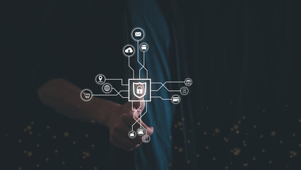 Cybersecurity and privacy concepts to protect data. Lock icon and internet network security technology. Businessman protecting personal data on network with virtual screen interfaces.