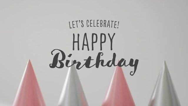 Animation of happy birthday text over party hats in background