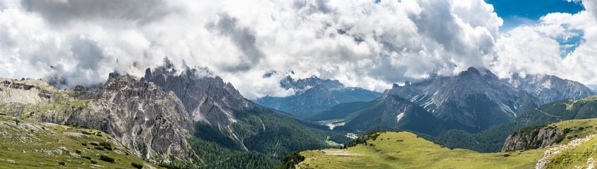 Fototapeta na wymiar Famous Tre Cime di Lavaredo at summer time. Landscape of Alps Mountains. Dolomites, Alps, Italy, Europe (Drei Zinnen)