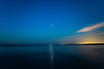 Fototapeta na wymiar Venus, stars and Baltic sea