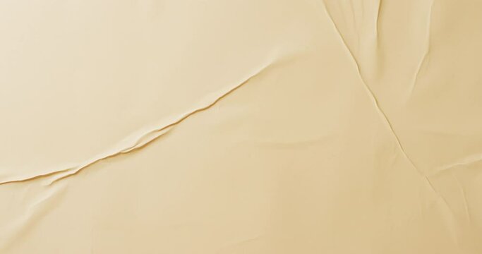 Video of close up of yellow creased fabric with copy space