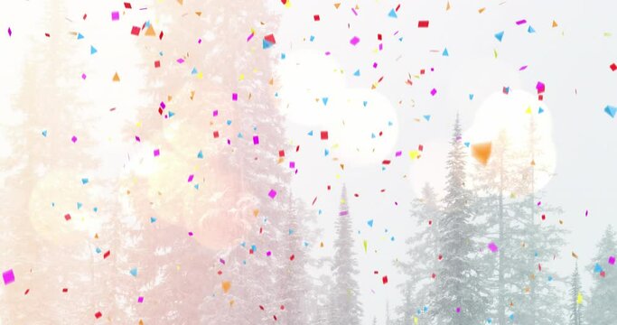 Animation of confetti falling over christmas trees in winter scenery