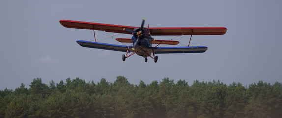 AIRPLANE - The biplane takes off from airfield