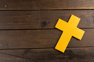 Composition of ash wednesday cross on wooden background with copy space