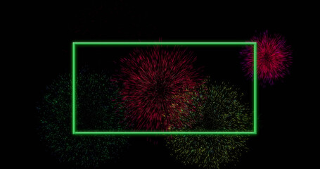 Image of green rectangle frame over colourful christmas and new year fireworks in night sky
