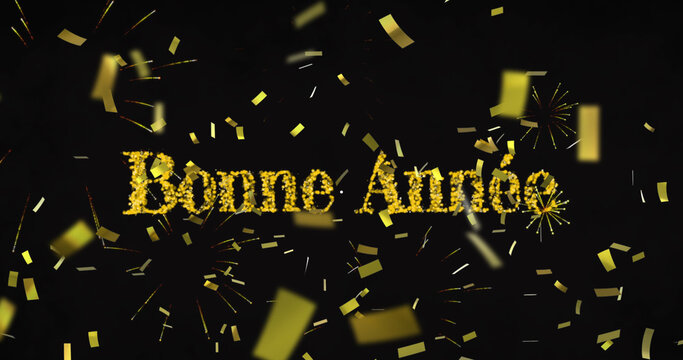 Image of bonne annee text in yellow with new year fireworks and gold confetti in night sky