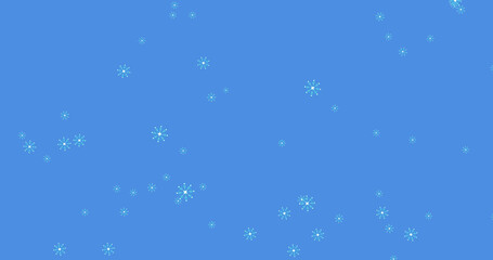 Obraz na płótnie Canvas Image of snow falling over blue background