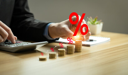 Interest rate and dividend concept, Businessman is calculating income and return on investment in...