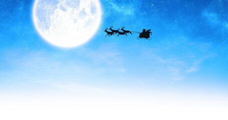Naklejka premium Image of santa claus in sleigh with reindeer over moon and sky
