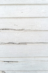 The background of weathered white painted wood
