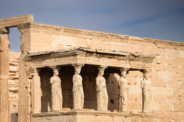 Fototapeta premium Acropolis Hill. Wide angle view of this iconic landmark from Athens, Greece, the Acropole old fortress during a sunny day.