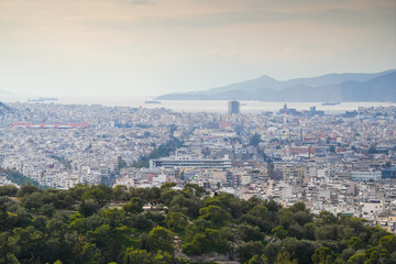 Athens from above. Detail aerial view of the ancient city center of Athens from Acropole during a sunny day in Greece.