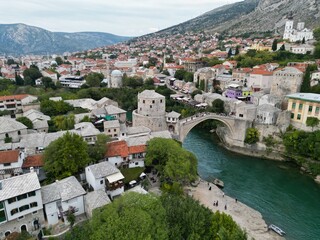 Fototapeta na wymiar Mostar old bridge Bosnia and Herzegovina drone aerial view summer high angle..