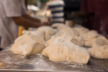 yeast dough on baking table. cooking process