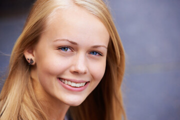 Portrait, teenager and smile for youth happiness or positive student mindset or education motivation. Young woman, happy face and studying confidence, smiling headshot or girl empowerment in Sweden
