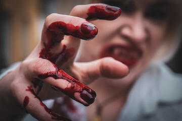 close up of a person holding a nail