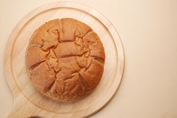 detail shot of whole grain baked bread on table 