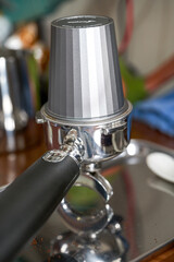 Close-up of coffee maker used by espresso machine