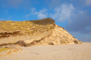 sea landscape with huge waves and empty beach at Hoernum