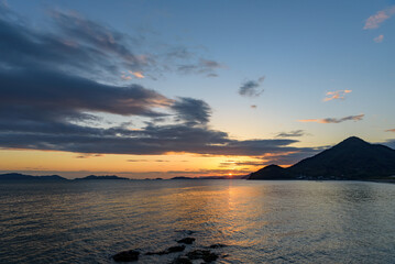 Naklejka na ściany i meble Sunset in the Seto Inland Sea, looking toward the Kasaoka Islands from Yorishima-cho