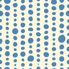 Blue dots and circles. Seamless abstract pattern in blue and beige colors.
