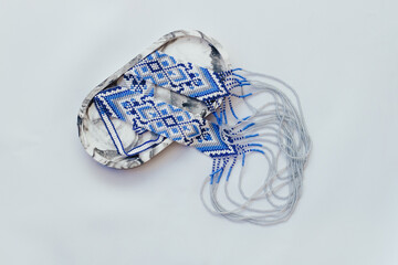 Geometric pattern on the gerdan ornament, Ukrainian beaded ornament, amulet.