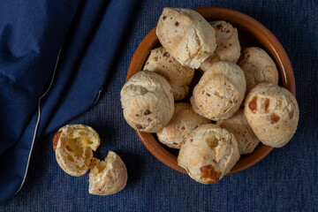 Top view of chipa, typical Paraguayan cheese bread, open to the middle.