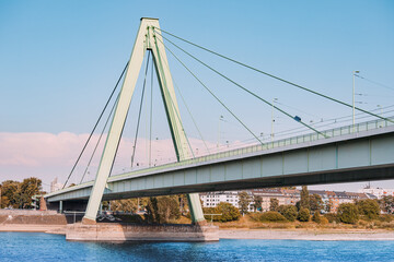 Deutz Suspension Bridge and Cologne skyline. Transport infrastructure and architecture