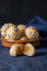 Chipa, typical Paraguayan cheese bread, open to the middle