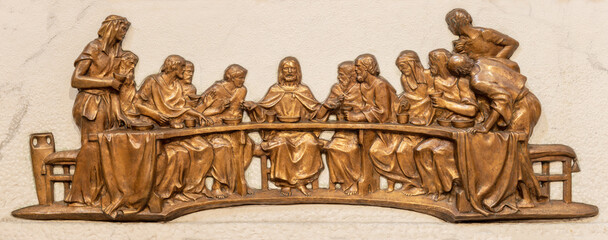 IVREA, ITALY - JULY 15, 2022: The bronze relief  the Laste Supper on the mensa of church Chiesa di...
