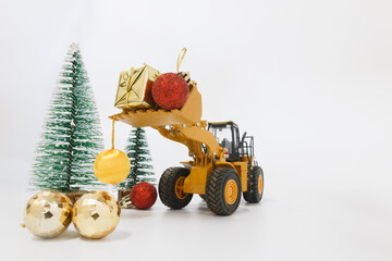 Christmas ornament with  Wheel Loader model , Holiday celebration concept new year on white...