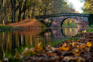 Wonderful old stone bridge at autumn