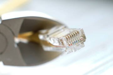 internet or telephone line cables and crimper. Concept of network troubleshoot supporter or administrator. Internet connection concept