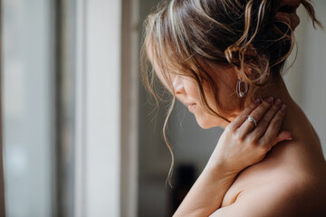 a delicate and sensual portrait of a middle-aged woman.