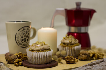 still life of cupcakes and coffee with Christmas and autumn supplies