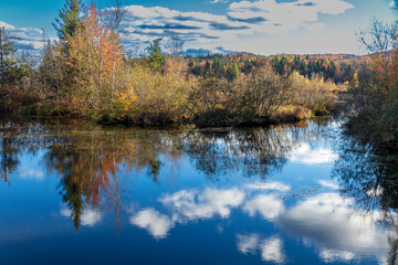 Clouds reflections at nord swamp, marais du nord, park. Quebec. Canada.