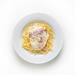 Classic pasta carbonara on whit plate on white background close up isolated top view isolated on white