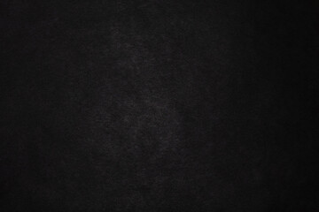 black non-uniform background, paper texture