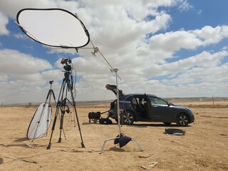 Documentary production set in the desert - 552372799