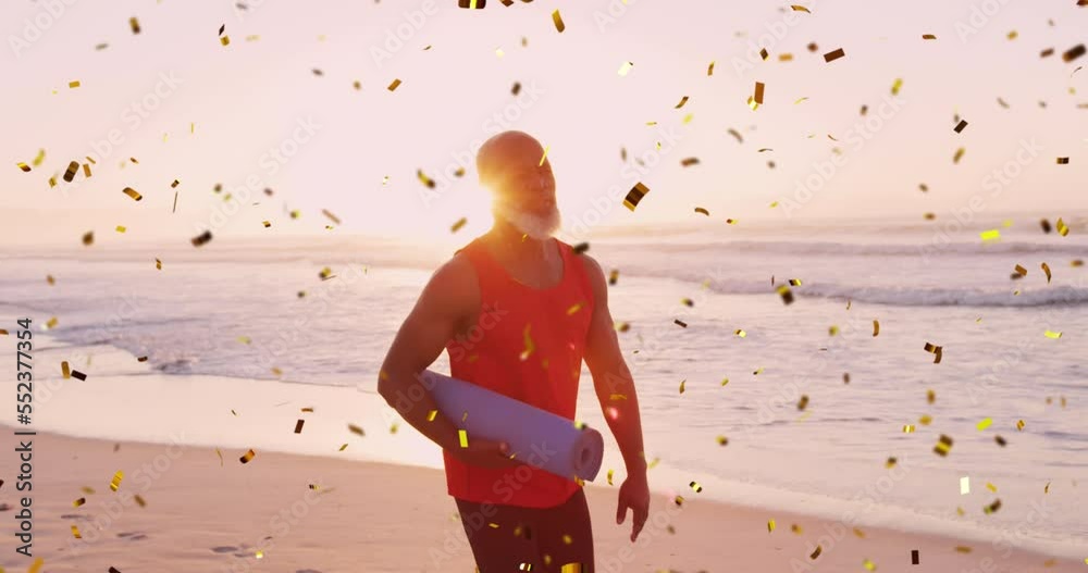 Poster Animation of confetti over african american senior man with yoga mat on beach at sunset