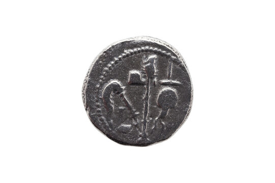 Silver Roman denarius coin replica of Roman emperor Julius Caesar celebrating his conquest of Gaul showing sacrificial implements, png stock photo file cut out and isolated on a transparent background