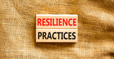 Resilience practices symbol. Concept word Resilience practices typed wooden blocks. Beautiful canvas table canvas background. Business and resilience practices concept. Copy space.