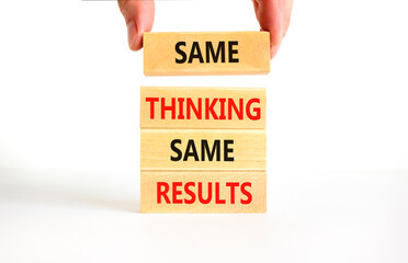 Same thinking and results symbol. Concept word Same thinking same results on wooden blocks....